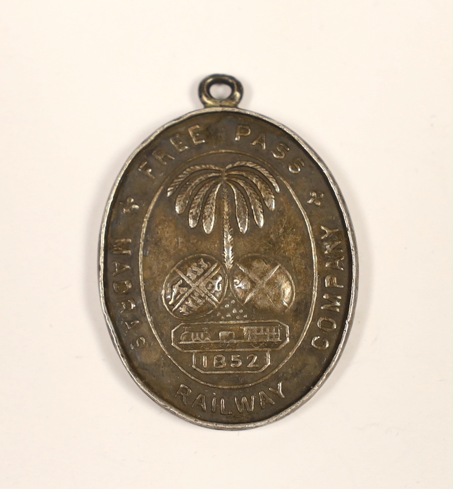 A scarce ‘Madras Railway Company free pass’ medallion, dated 1852, engraved ‘No125 ASST. TRAFFIC MANAGER’